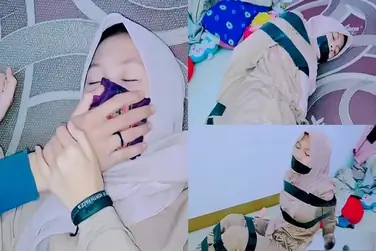 Bokep Jilbab Ukhty Remaja Cantik Mulut Lakban BDSM Hot poster